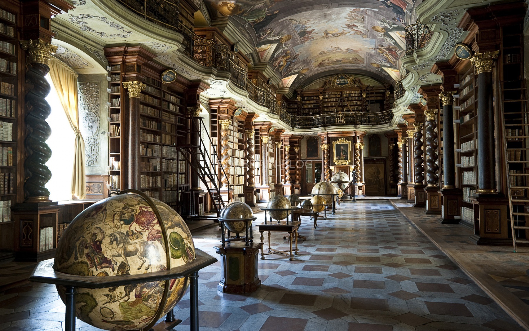 Baroque library hall with ceiling artwork by Jan Hiebl, Clementinum, Prague, Czech Republic